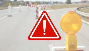 Illustrazione di un posto di blocco (Canva foto) - buildingcue.it