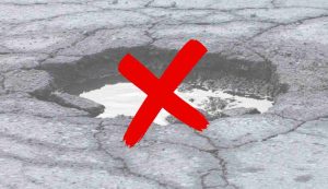 Illustrazione di una buca (Canva FOTO) - buildingcue.it